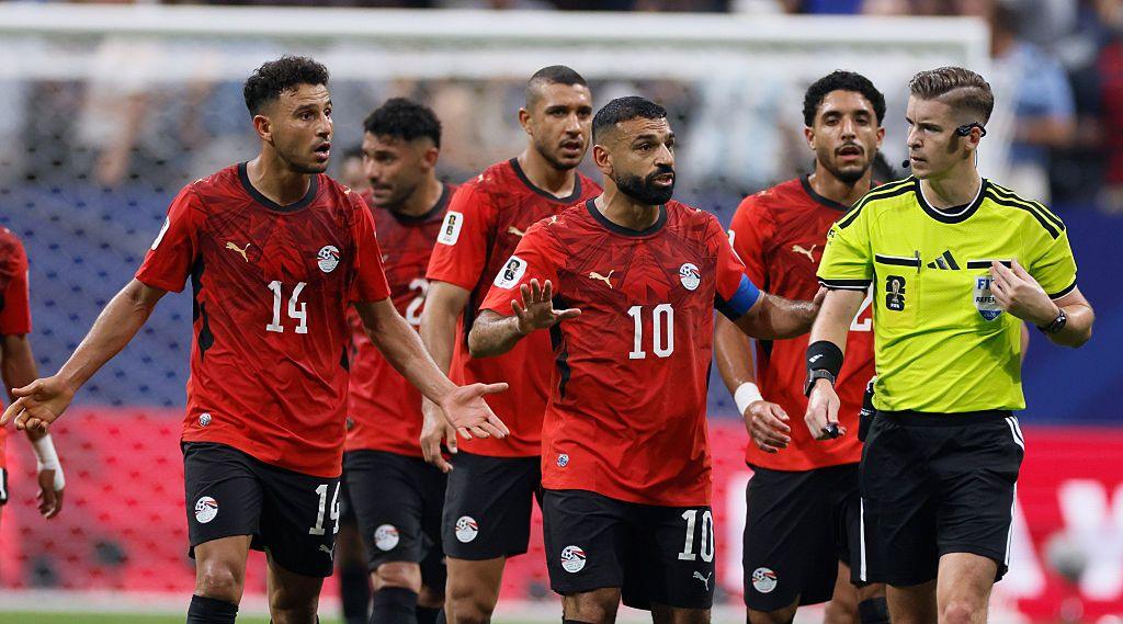 Egypt players react after controversial VAR decisions in their World Cup defeat to Argentina amid FIFA bias claims.
