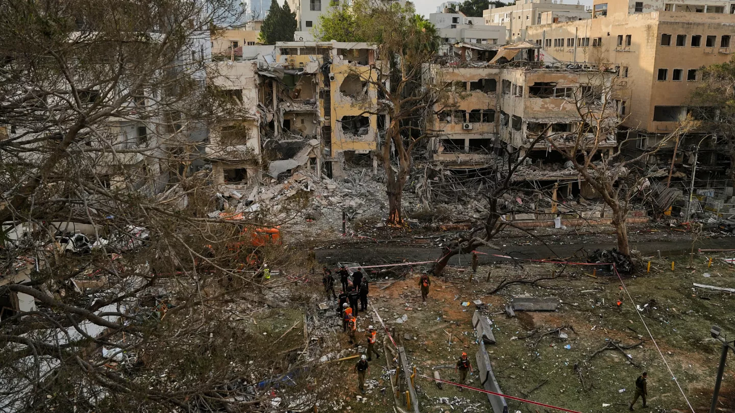 Middle East conflict escalates as smoke rises over a Gulf city following missile and drone attacks.