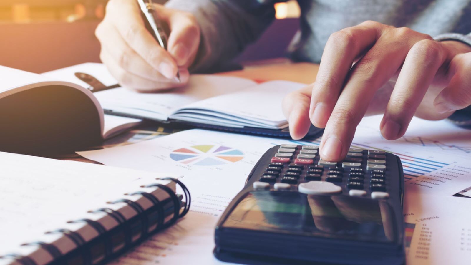 Massive fire and smoke at Russia’s Ust-Luga oil terminal after drone strike, with industrial tanks and flames visible.