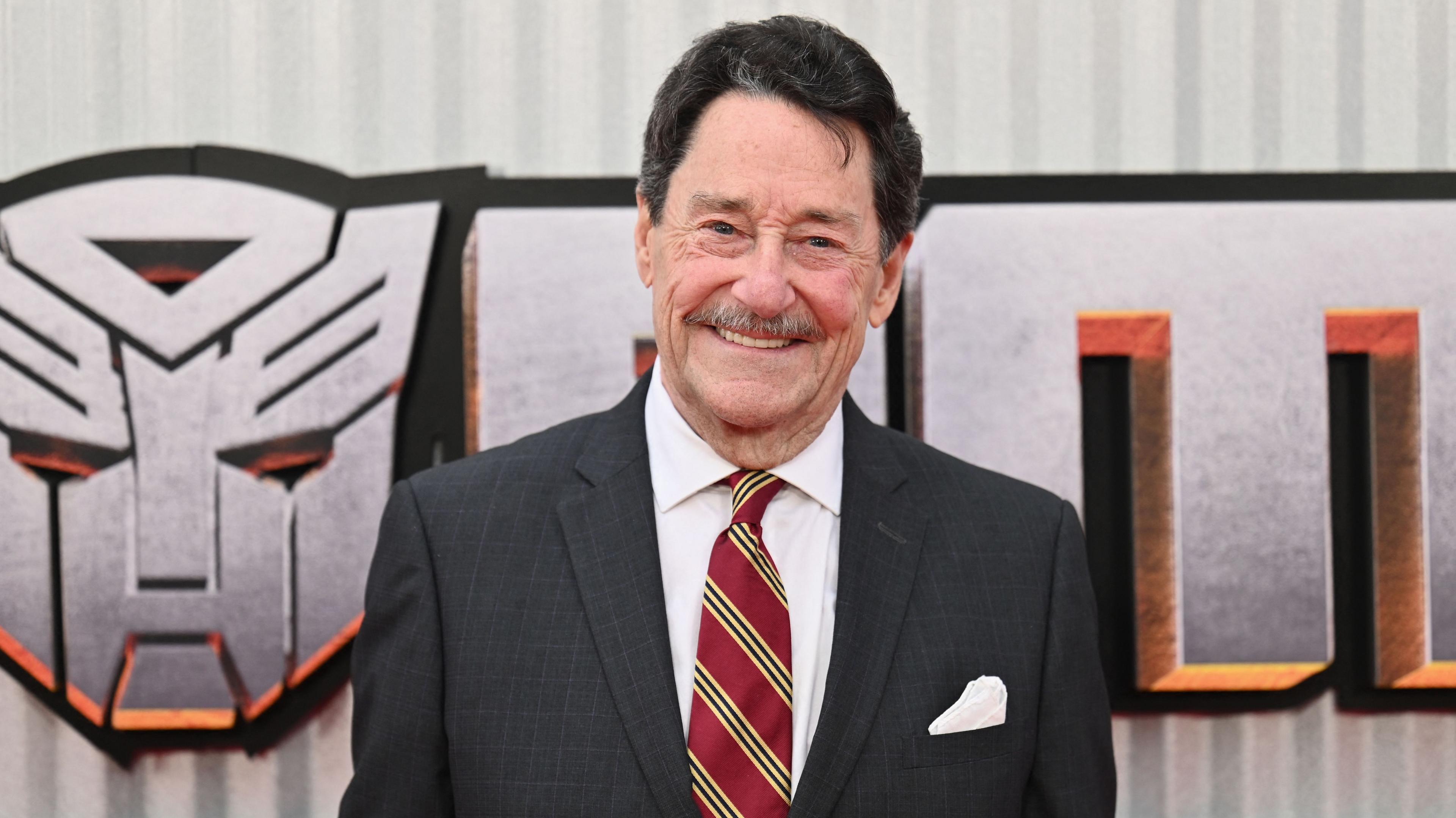 Peter Cullen as the iconic voice of Optimus Prime, highlighting the Bumblebee controversy and his Transformers legacy.