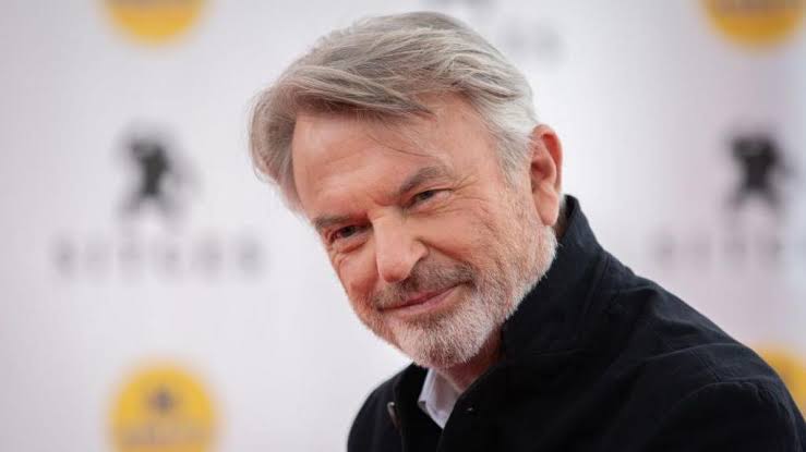 Portrait of actor Sam Neill, remembered for his iconic role in Jurassic Park and a celebrated film career.