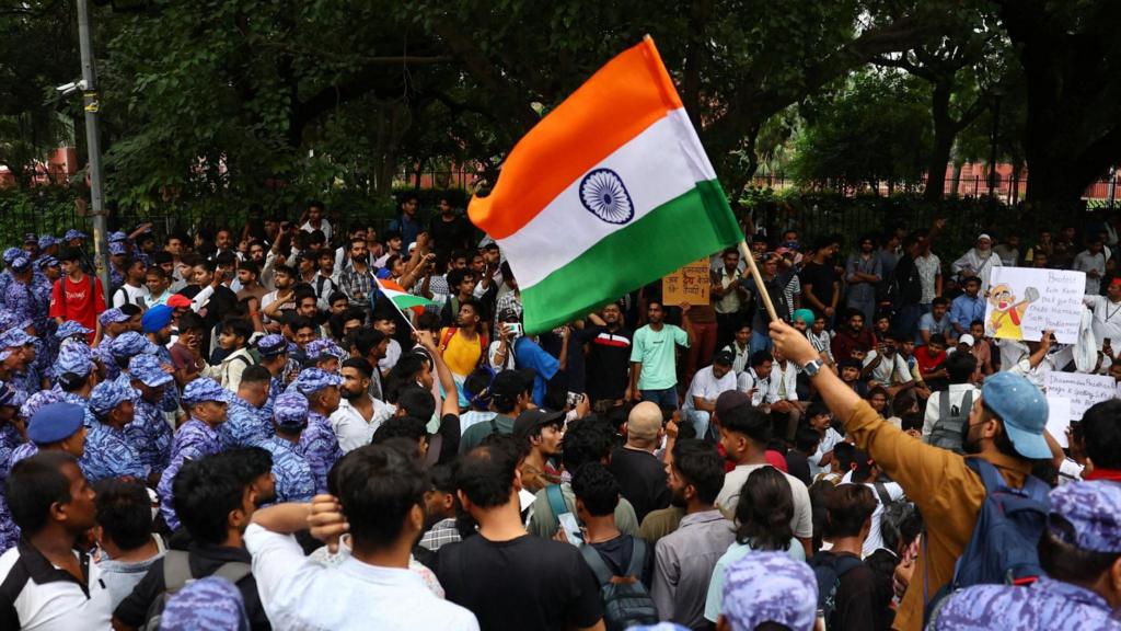 Youth protesters gather near India's Parliament in New Delhi, calling for education reforms and exam transparency.