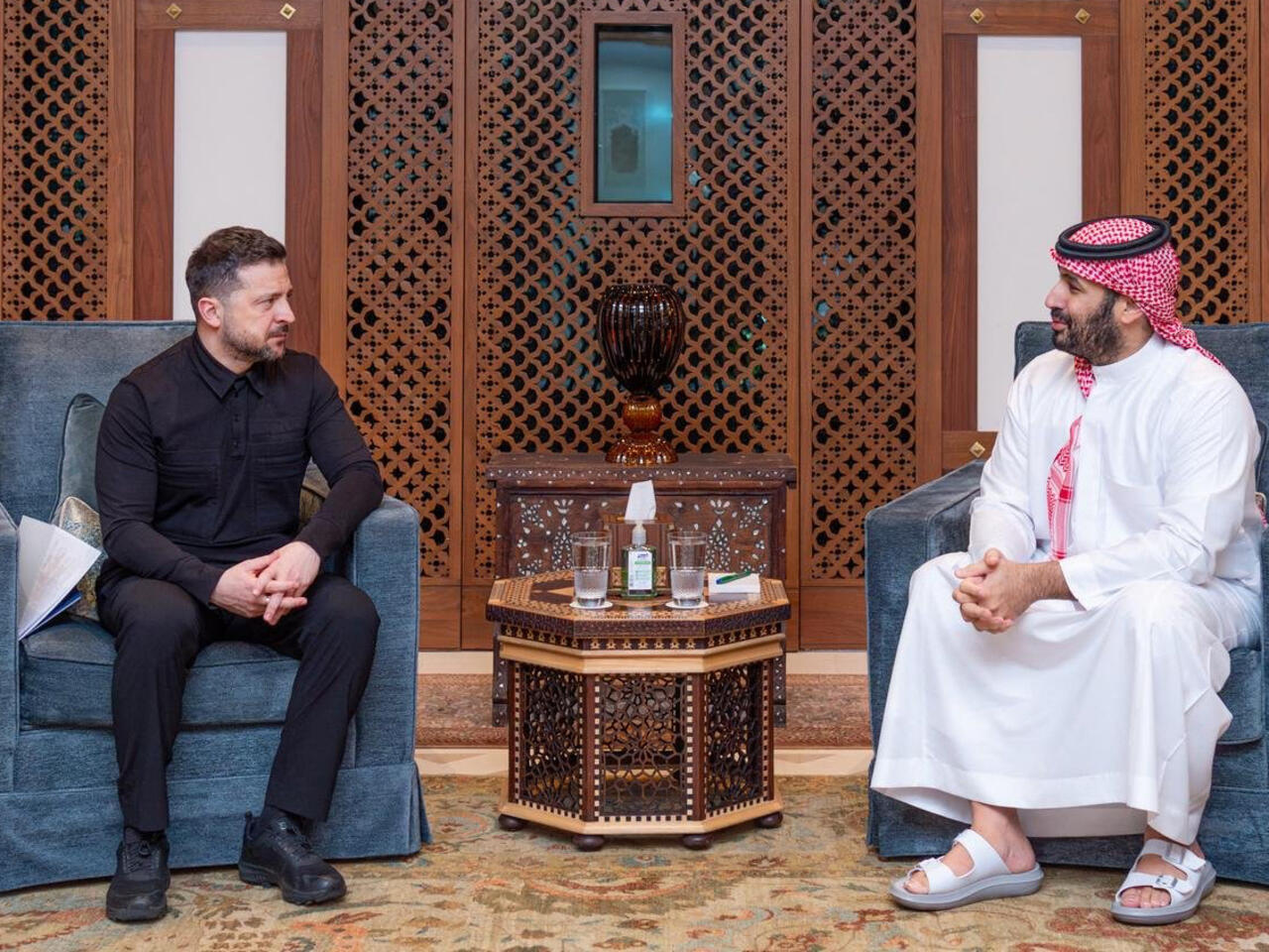 News graphic showing Donald Trump and Iran leadership with oil tanker and fire backdrop, highlighting rising tensions and Hormuz deadline extension.